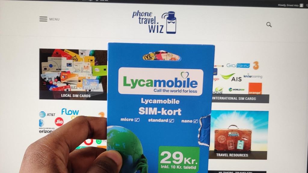 Adu from Phone Travel Wiz holding a Lycamobile Denmark SIM Card