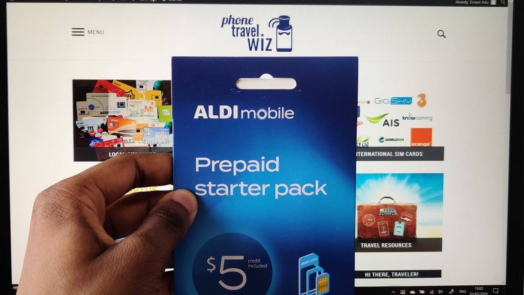 Adu from Phone Travel Wiz holding an ALDImobile SIM Card